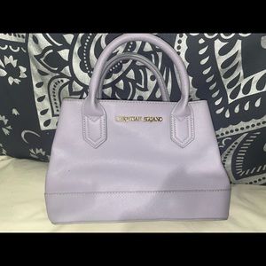 Christian Siriano purple cross body bag